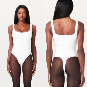 Naked Wardrobe NWT SMOOTH SCOOPED TANK BODYSUIT in White Size M
